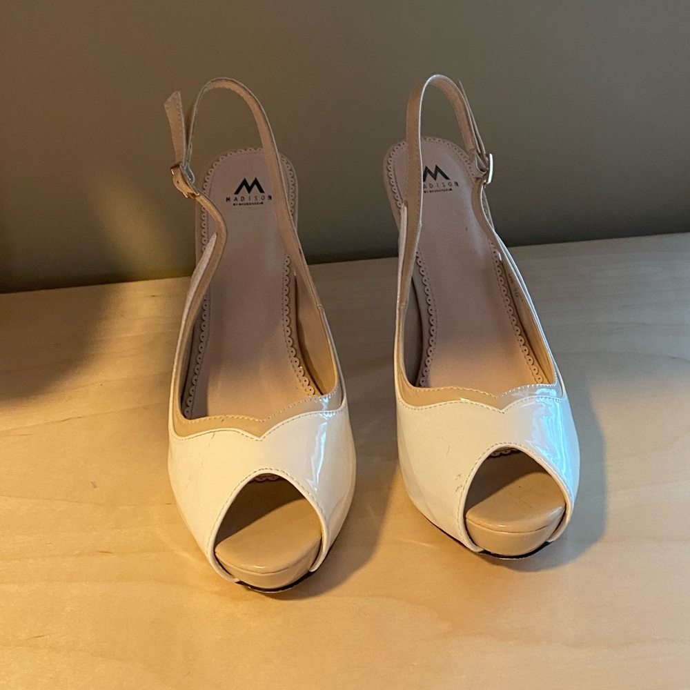White and tan medium height peep toe slingbacks